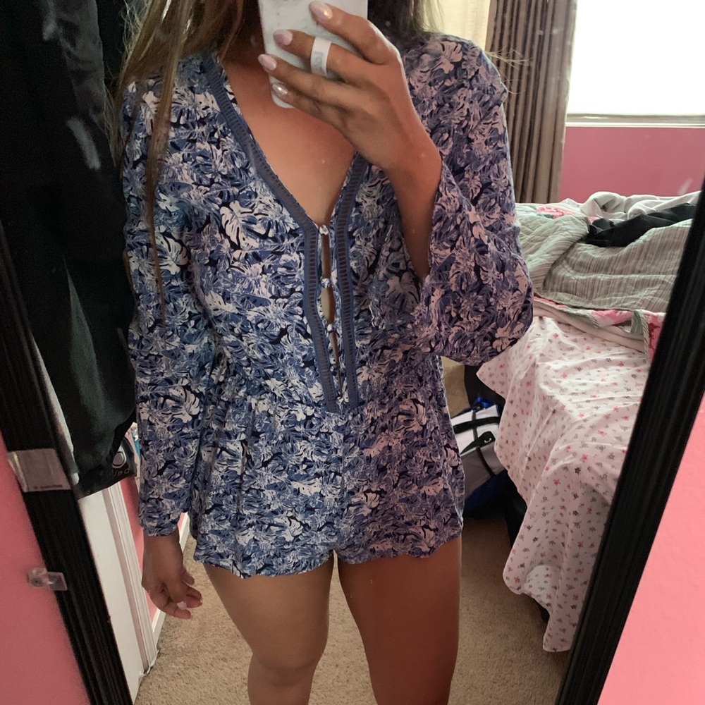 Boutique blue bell sleeve floral romper
